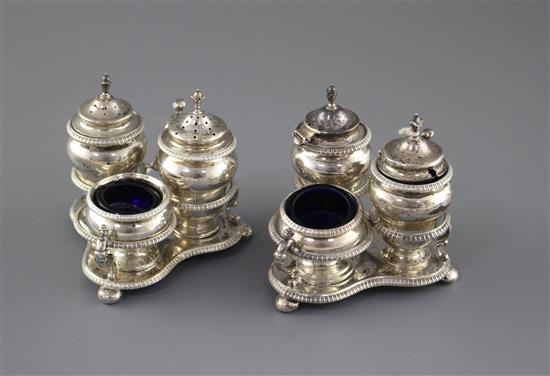Two similar late 19th/early 20th century silver triform cruet stands by Horace Woodward & Co, London, 1896/1903/1910,